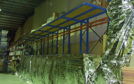 Completed canoe wrapped in foil to maintain steady temperature throughout treatment